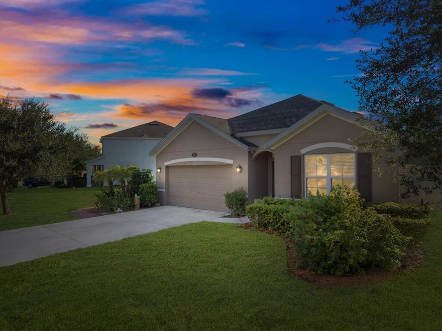 Enjoy peaceful mornings on your covered patio overlooking the tranquil lake. This beautifully maintained 4-bedroom, 2-bath, 2-car garage home sits on one of the largest lots in this sought-after gated community, offering both space and serenity. The open floor plan features tile throughout, a modern kitchen with granite countertops, and stainless steel appliances--blending comfort and style seamlessly. Both bathrooms include matching granite finishes for a cohesive, upscale look. With lawn care included, this property offers effortless living in a well-kept neighborhood. This home has been lovingly cared for--come see for yourself!