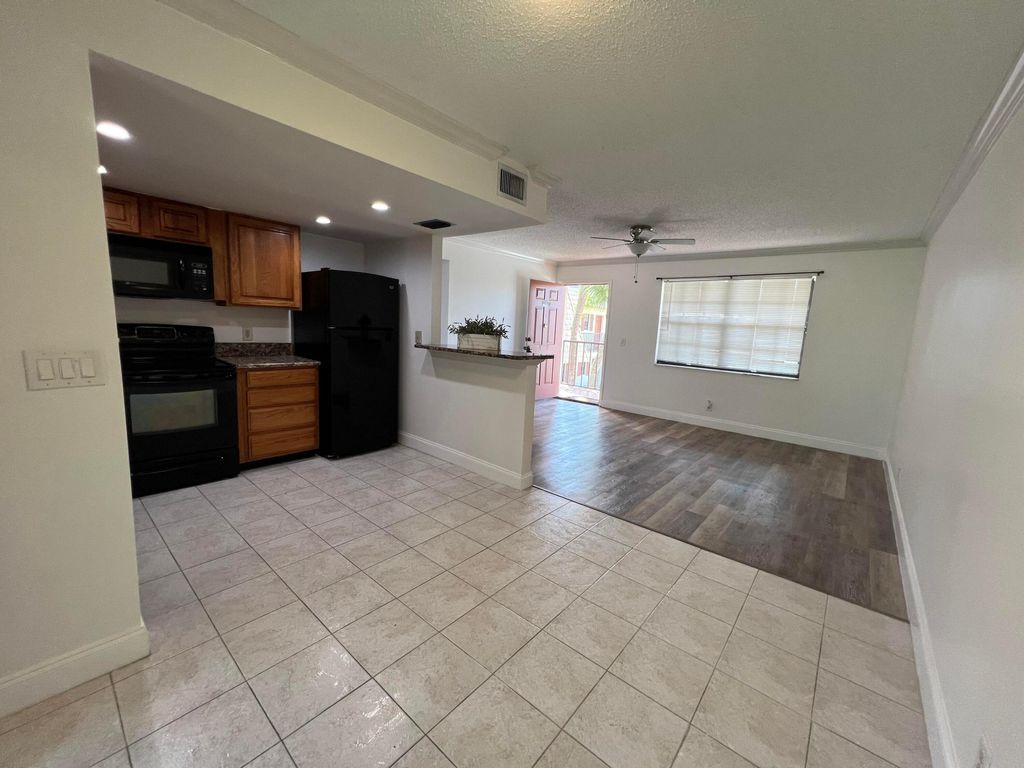 Photo of 4175 Oak Terrace Drive, Greenacres, FL 33463 (MLS # R11093704)