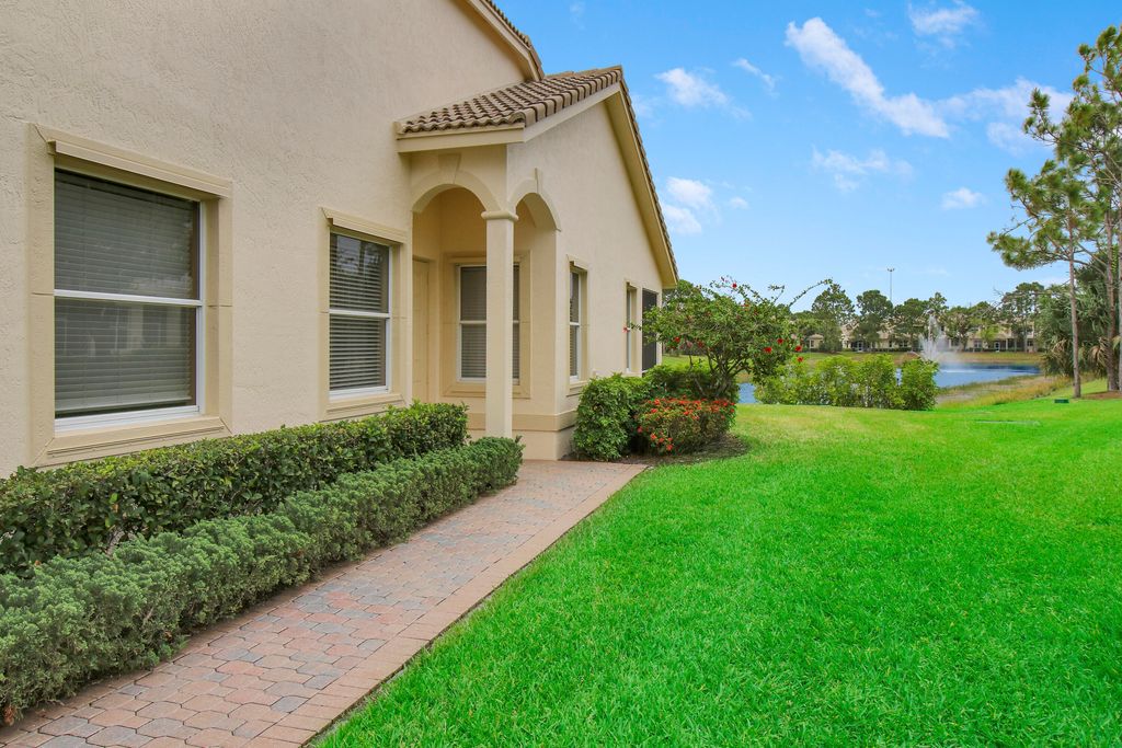 Photo of 9015 Sand Shot Way, Port Saint Lucie, FL 34986 (MLS # B26016230)