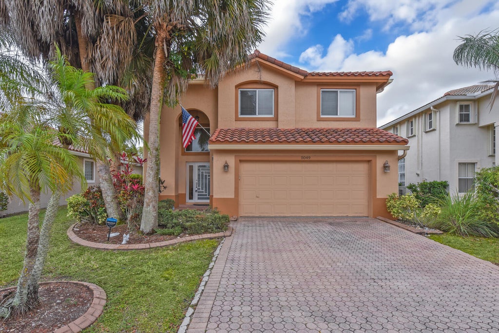 Photo of 5049 NW 121st Drive, Coral Springs, FL 33076 (MLS # B26005969)