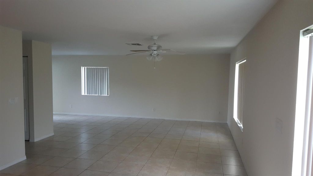 Photo of 1919 SW Newport Isles Boulevard, Port Saint Lucie, FL 34953 (MLS # R10997083)