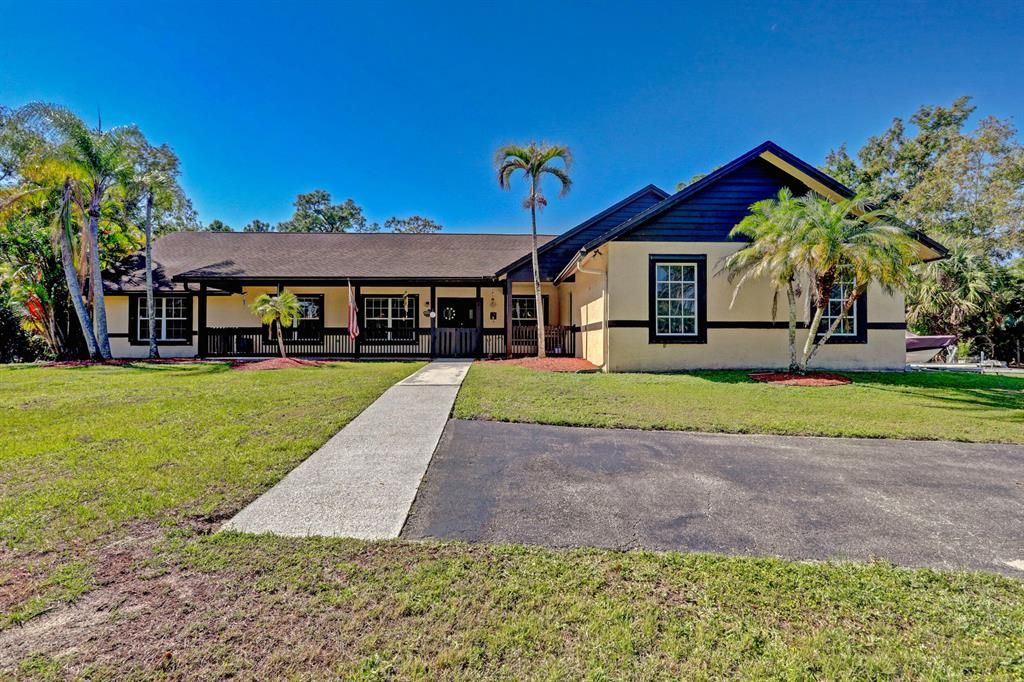 Photo of 13742 Tangerine Boulevard, The Acreage, FL 33412 (MLS # R10786899)