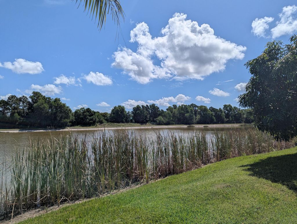Photo of 411 SW Vista Lake Drive, Port Saint Lucie, FL 34953 (MLS # R11113164)