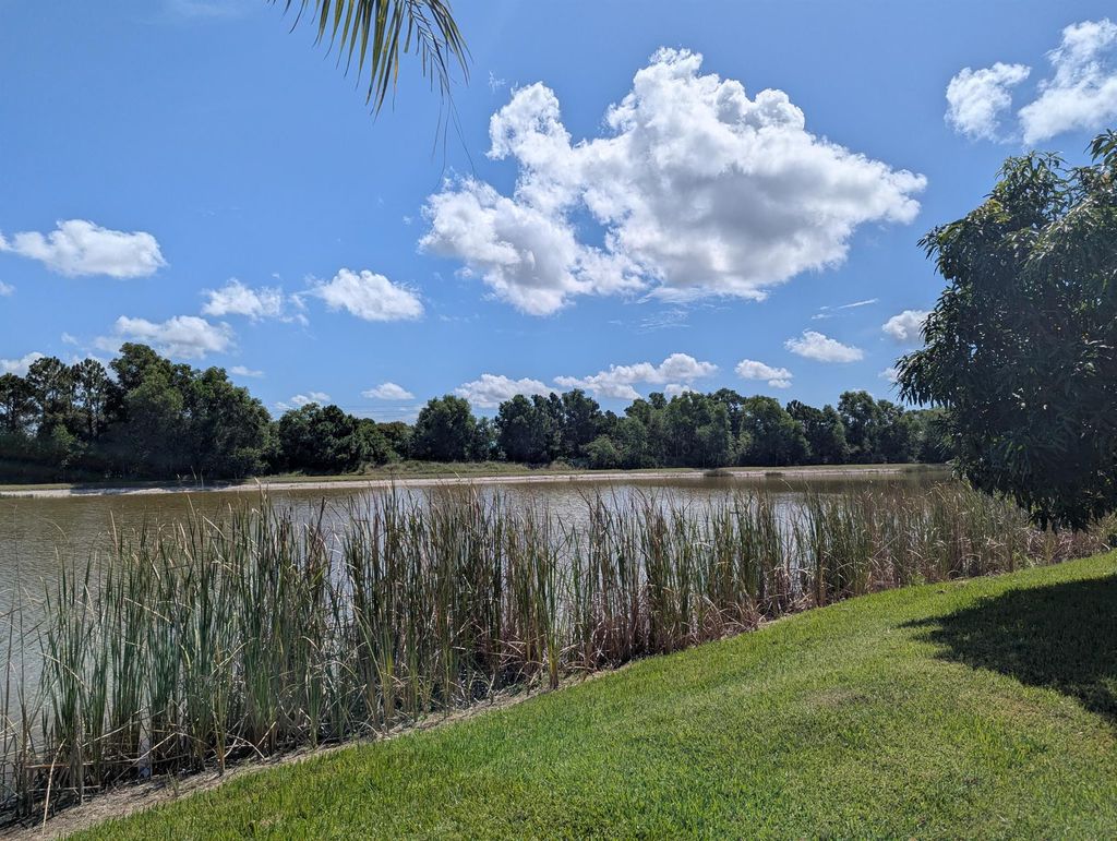 Photo of 411 SW Vista Lake Drive, Port Saint Lucie, FL 34953 (MLS # R11113164)