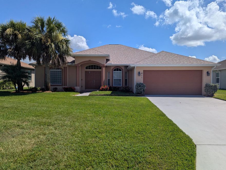 Waterfront beauty in The Estates at Sawgrass Lakes! This 3/2/2 offers a bright, open design with defined living and family rooms, elegant formal dining, and a welcoming breakfast bar. Stylish tile flows through the main living spaces, while bedrooms enjoy warm wood-look laminate. The kitchen is a chef's delight with granite counters, ample cabinetry, pantry, and newer stainless steel appliances. Step through French doors to a covered lanai, where a spacious backyard and sweeping lake views create the perfect backdrop for morning coffee or sunset gatherings.  Available now!  Basic cable, internet included.