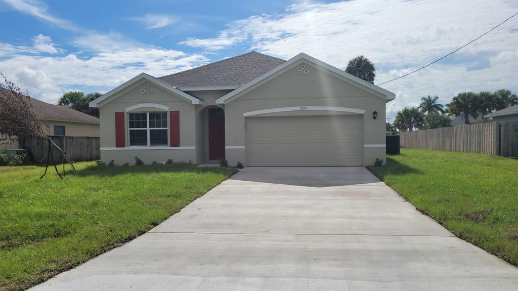 Photo of 2525 SW Westtfiled Street St, Port Saint Lucie, FL 34953 (MLS # R10829404)
