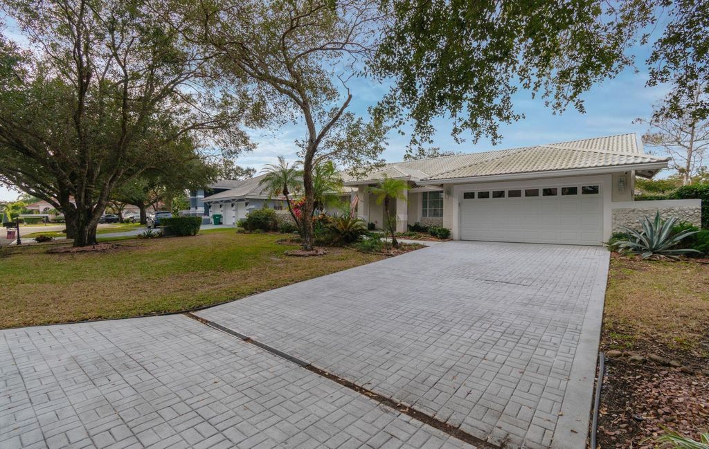 Photo of 6000 NW 63rd Place, Parkland, FL 33067 (MLS # F10480183)