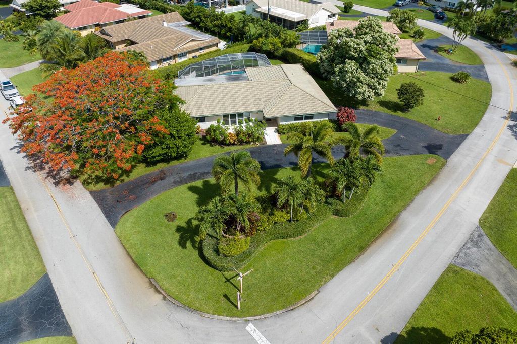 Photo of 208 Gleneagles Drive, Atlantis, FL 33462 (MLS # R10951442)