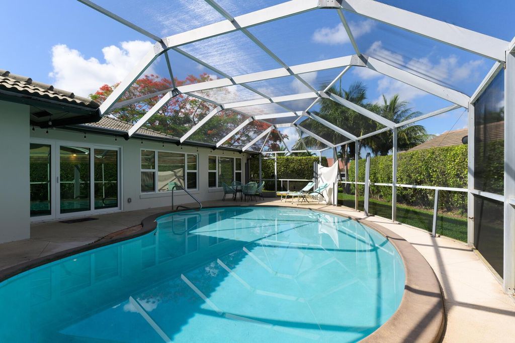 Photo of 208 Gleneagles Drive, Atlantis, FL 33462 (MLS # R10951442)