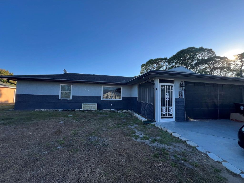 Photo of 538 NW Placid Avenue, Port Saint Lucie, FL 34983 (MLS # F10550213)