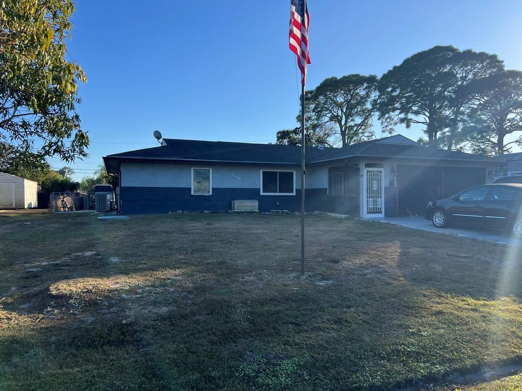 Photo of 538 NW Placid Avenue, Port Saint Lucie, FL 34983 (MLS # F10550213)