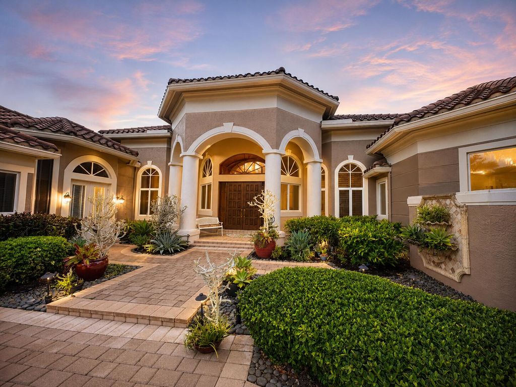 Photo of 32 Saint Thomas Drive, Palm Beach Gardens, FL 33418 (MLS # B26033778)