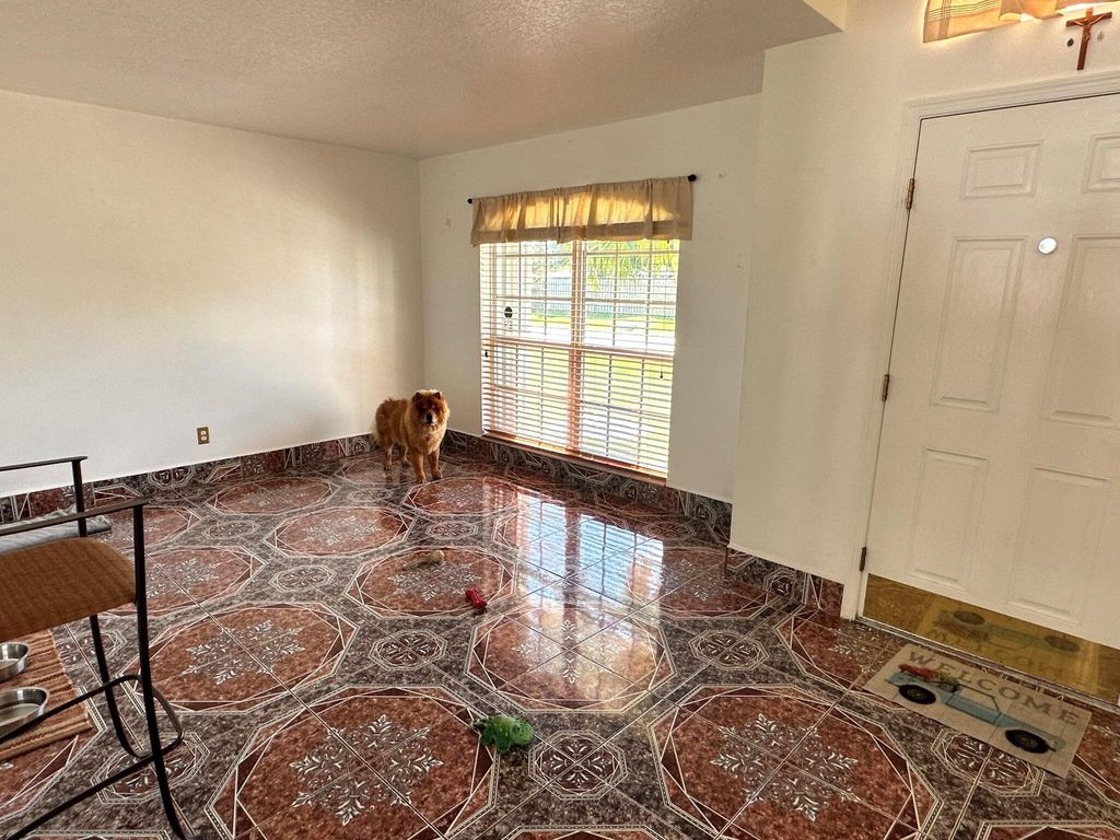 Photo of 1361 SW Gastador Avenue, Port Saint Lucie, FL 34953 (MLS # R10975195)