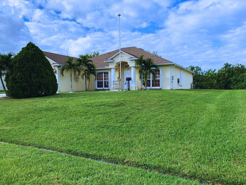 Photo of 1361 SW Gastador Avenue, Port Saint Lucie, FL 34953 (MLS # R10975195)