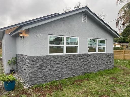 Updated 3 bedroom home ready for immediate occupancy! Bright granite kitchen with newer stainless steel appliances, updated bathrooms, and spacious fenced backyard! Convenient access to downtown Fort Pierce, shopping, restaurants, entertainment, and highways! Call today to schedule a private showing.