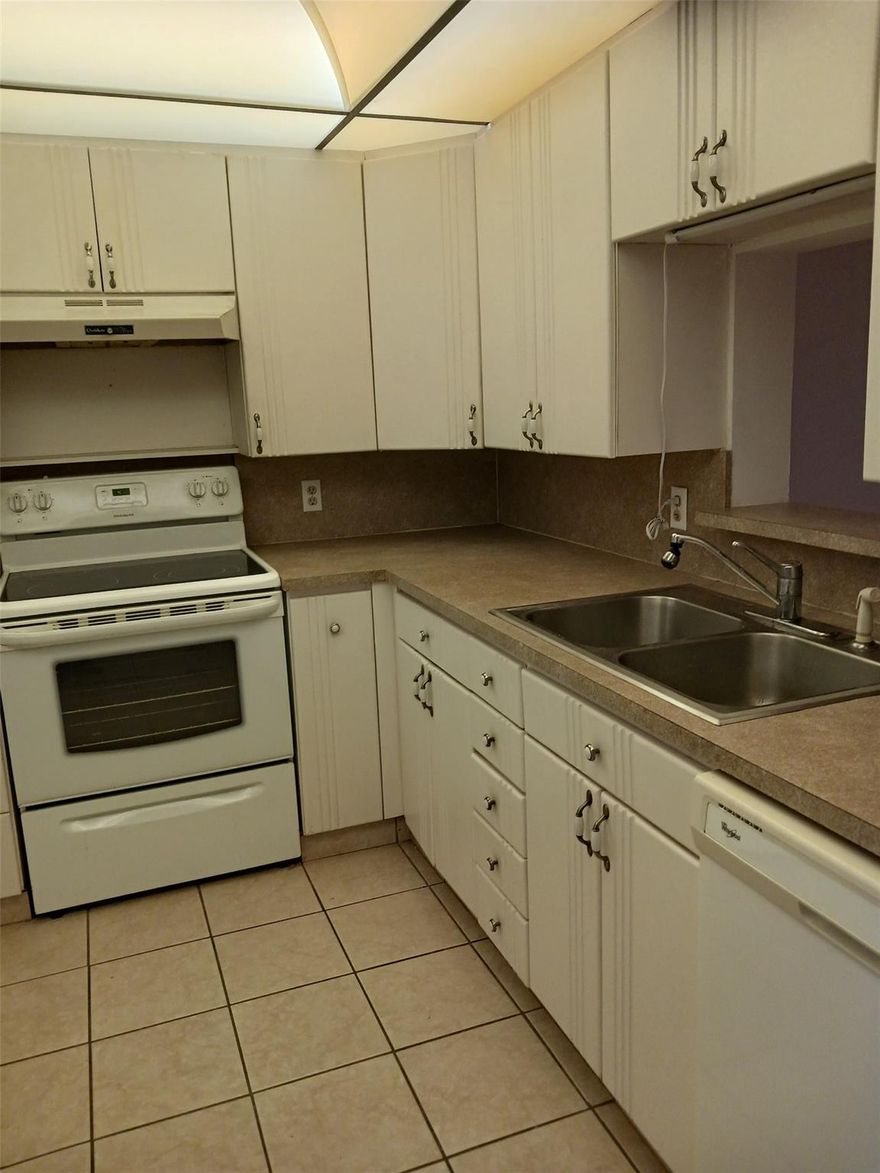 2/2 ground floor golfview of the 4th hole , prime parking space right in front of the building entrance. Unit is right across from the satellite pool. The unit is freshly painted and brand new neutral laminate flooring just installed. Enclosed patio- free local phone and free hotwire TV- tons of amenities in this adult community 0f  Wynmoor. It is really a resort style 55+ community which includes a golf course, pools, tennis, pickle ball, fitness center, theater, cafe, and endless clubs and events. It is minutes to shopping, dining, and highways. It is country club living at an unbeatable value.