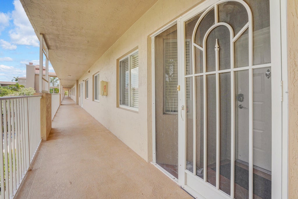 Photo of 5874 CRYSTAL SHORES Drive #308, Boynton Beach, FL 33437 (MLS # B26085409)