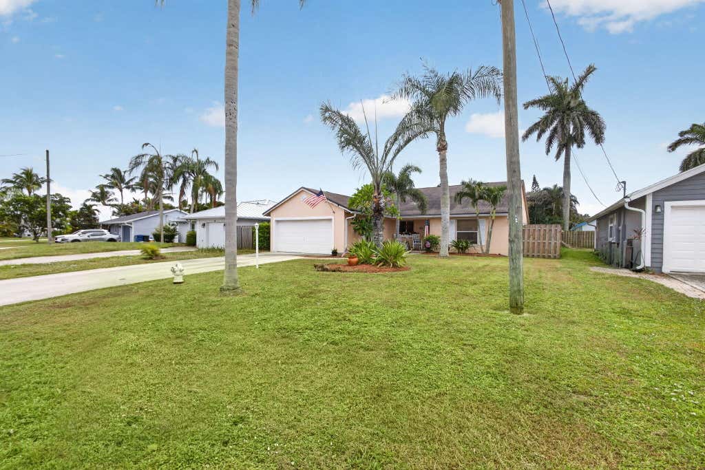 Photo of 6312 MULLIN Street, Jupiter, FL 33458 (MLS # B26059275)