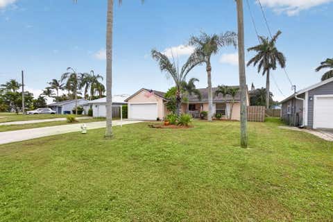 Photo of 6312 MULLIN Street, Jupiter, FL 33458 (MLS # B26059275)