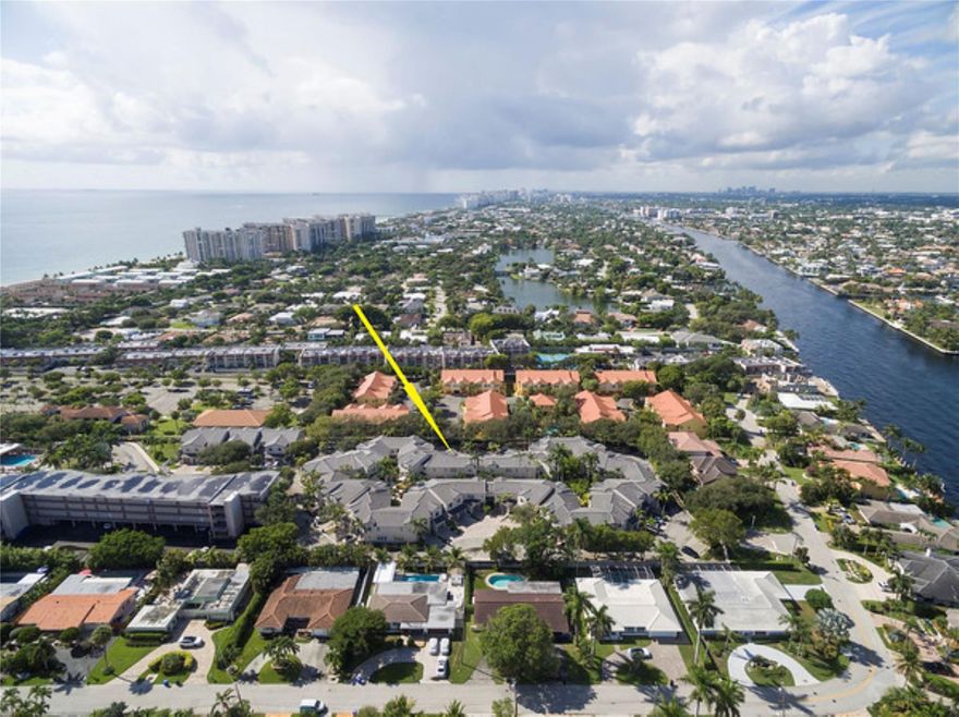 Welcome to Oceanwalk Villas.  This Boutique Complex of just 47 Townhomes is directly across from the Town Beach access and walking distance to the Shops of Sea Ranch Lakes and Downtown Lauderdale by the Sea.  Meticulously Kept Unit offers Tile and Laminate Wood Like flooring Throughout.  Updated A/C 2018. Updated Hot Water 2021.  Association Roof Replaced in 2020.  Second Floor Laundry, Walk in Closet in Primary Bedroom.  Charming Patio overlooks Landscaped Courtyard with Fountain.  Attached single car garage and space in front of garage included.  Two Car Max Per unit.  Pet Friendly complex that allows two pets and Rentals are ok first year of ownership, but limited to one time per year 90 day min.