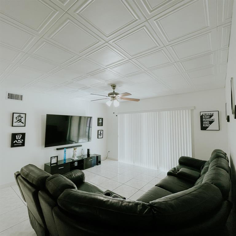 Gorgeous and perfectly maintained FIRST FLOOR 2 BEDROOM 2 FULL BATH condo in the ALL AGES section of Pine Ridge. This home features WELL-PROPORTIONED rooms, UPDATED KITCHEN will delight you with WOOD CABINETS and GRANITE COUNTERTOPS. The main bedroom features an ENSUIT BATHROOM and WALKING CLOSET. It's ALL TILE FLOORING and has indoor stacked WASHER AND DRYER. Convenient ACCORDION HURRICANE SHUTTERS and a private SCREENED PATIO with STORAGE CLOSET just outside of unit. PERFECTLY SITUATED in Greenacres just minutes to the mall at Wellington Green (5 miles), Okeeheelee Park (4 miles) Beaches (8 miles) and the airport (8 miles). Pine Ridge is a nice and quiet community with a large pool, grilling areas, shuffleboard and tennis courts. See for yourself what this home has to offer.