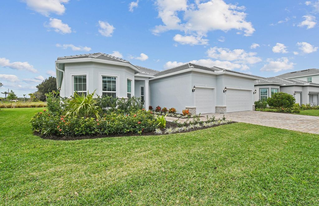 Photo of 9840 SW Legacy Drive, Stuart, FL 34997 (MLS # R10968311)