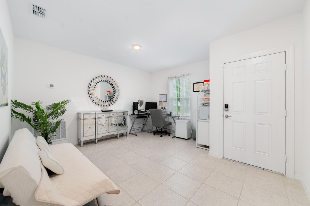 Photo of 3020 SW Ann Arbor Road, Port Saint Lucie, FL 34953 (MLS # B26018811)