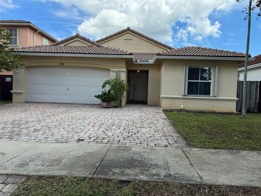 Spacious 3-bedroom, 2-bath home featuring a Floridian room, bright living & dining areas, and a large kitchen. Generous layout with plenty of room to entertain indoors or outdoors. Relax in the backyard, perfect for gatherings & barbecues. Nestled in a quiet, friendly community near top schools, shopping, dining, malls, and hospitals. Easy access to the Turnpike makes commuting simple. A perfect blend of comfort, convenience, and lifestyle in Homestead!