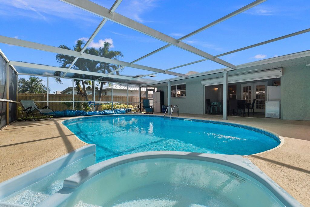 Photo of 2449 SE Sidonia Street, Port Saint Lucie, FL 34952 (MLS # R11107052)