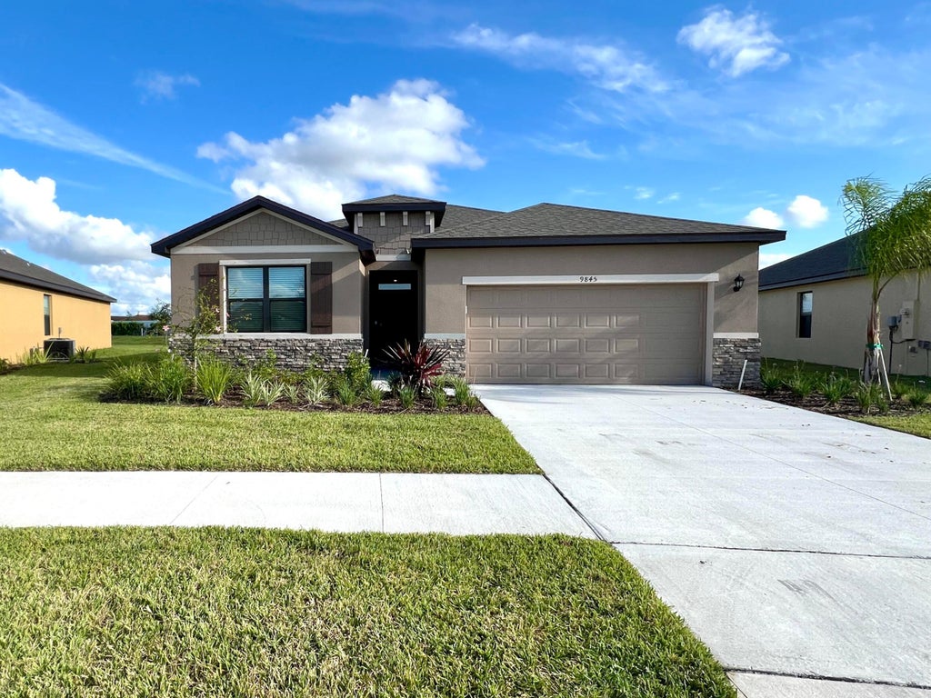 Photo of 9845 SW Triton Way, Port Saint Lucie, FL 34987 (MLS # R11045837)