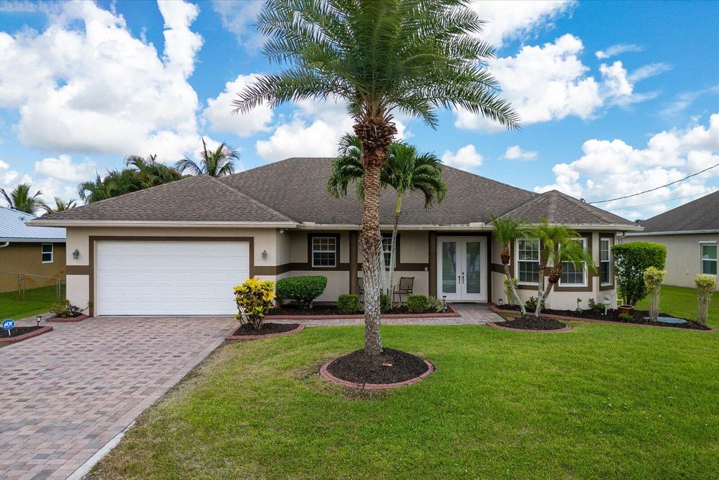 Photo of 5446 NW Edgewater Avenue, Port Saint Lucie, FL 34987 (MLS # R11118079)