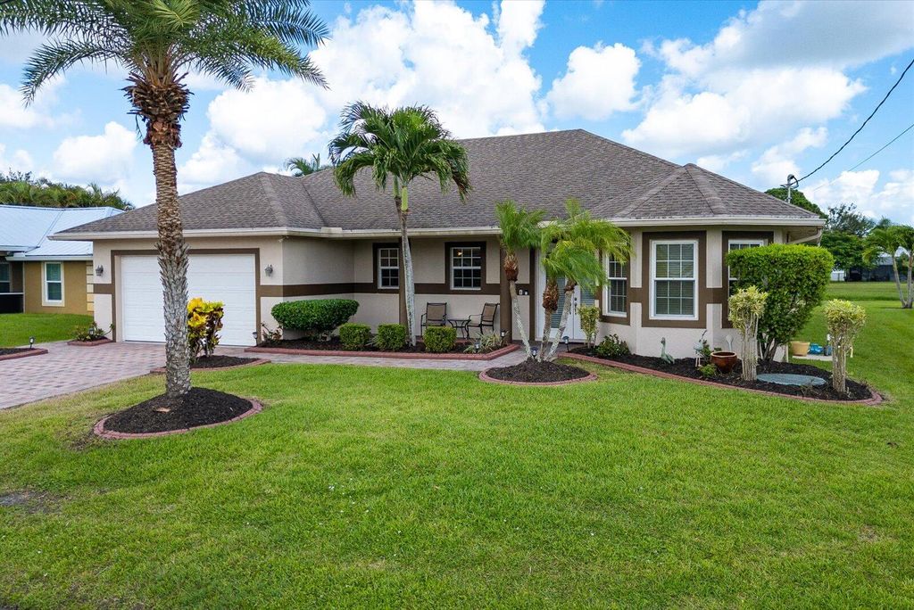 Photo of 5446 NW Edgewater Avenue, Port Saint Lucie, FL 34987 (MLS # R11118079)