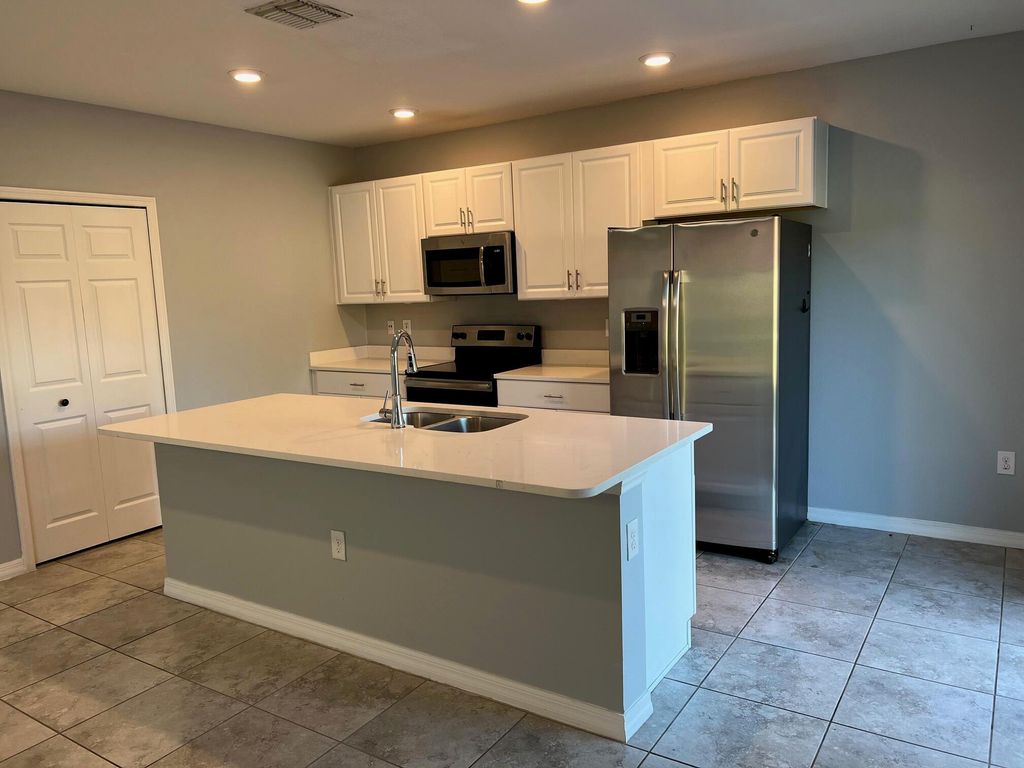 Photo of 2073 SW Ember Street, Port Saint Lucie, FL 34953 (MLS # R10985353)