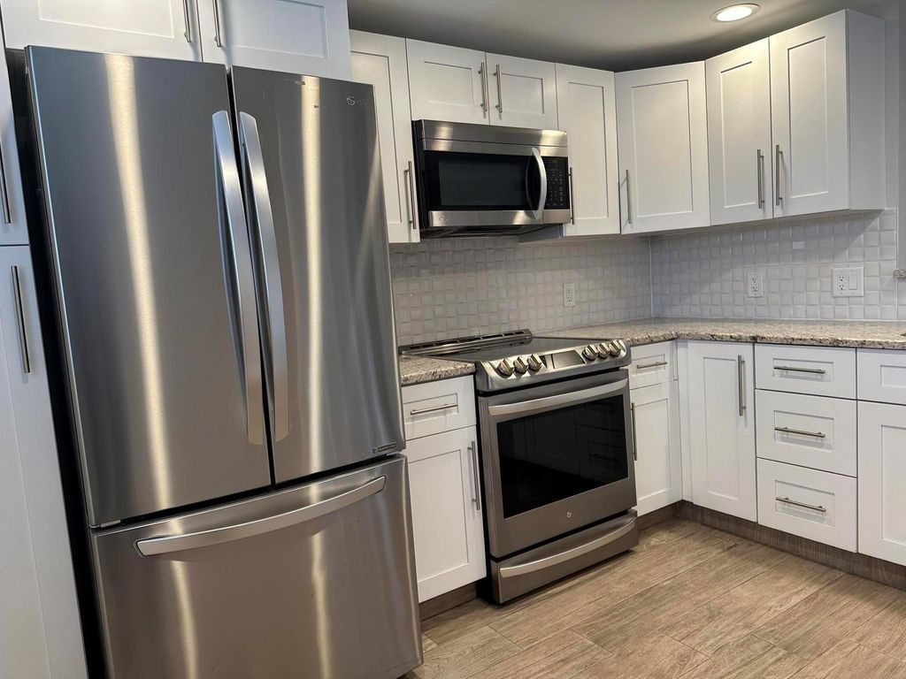 Photo of 250 John F Kennedy Ph4 Drive #Ph4, Atlantis, FL 33462 (MLS # R11056224)