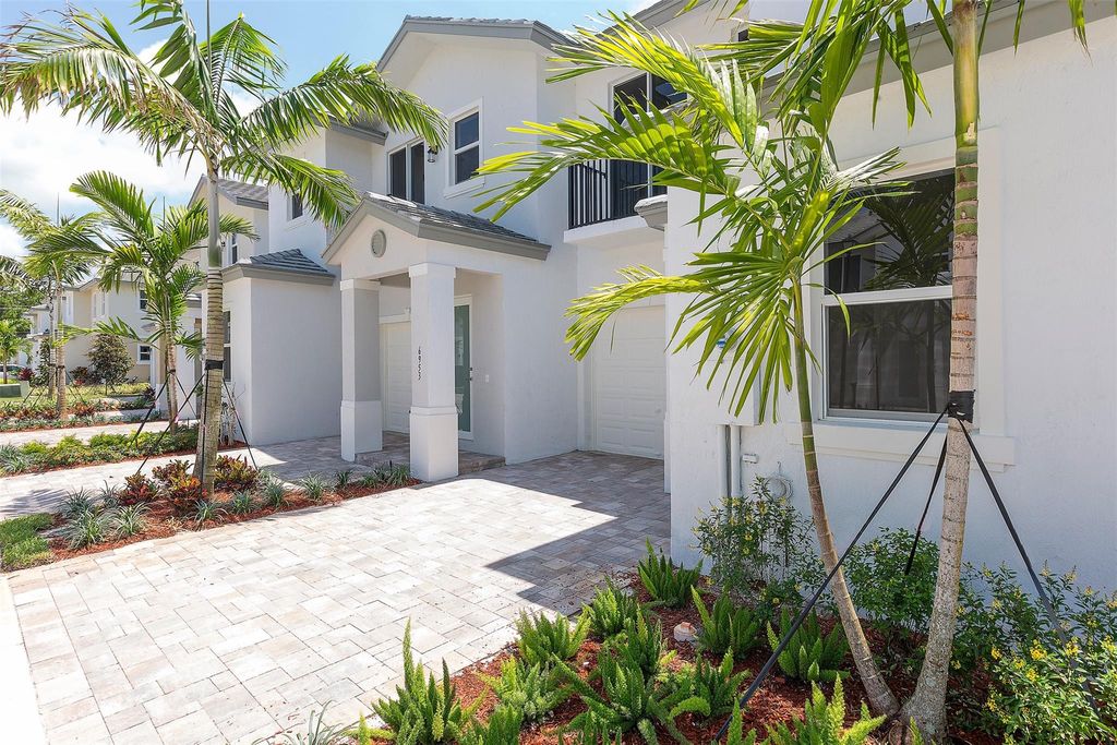 Photo of 6933 Pines Circle #15, Coconut Creek, FL 33073 (MLS # F10416971)