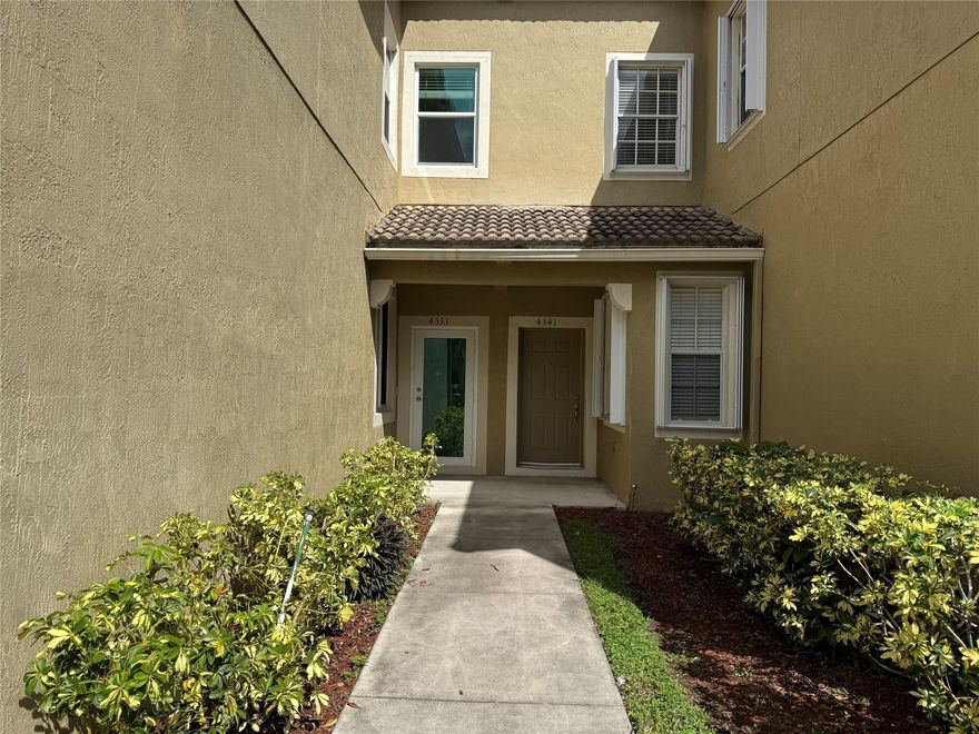 Beautiful lake view three bedroom townhome tastefully renovated. Tiles throughout the property, no carpet. Spacious kitchen features two refrigerators, stainless steel appliances and quartz countertop. Bathrooms have been beautifully renovated. All windows and doors are hurricane impact proof. Rent includes water, sewer and internet. Main bathroom has a shower separate from the perfect tub to soak and relax, dual sinks for his and hers and the guest bathroom has a tub and shower combination. Main bedroom over looks the paeceful lake and features a large walking closet. Perfect back patio overlooking the lake just bring your grill. The community has a great clubhouse with a swimming pool, gym, tennis and basketball courts and a social clubroom perfect for private parties. Split Bedrooms