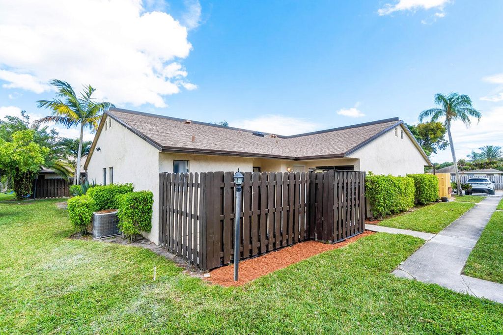 Photo of 3701 Waterview Circle, Palm Springs, FL 33461 (MLS # R10960133)