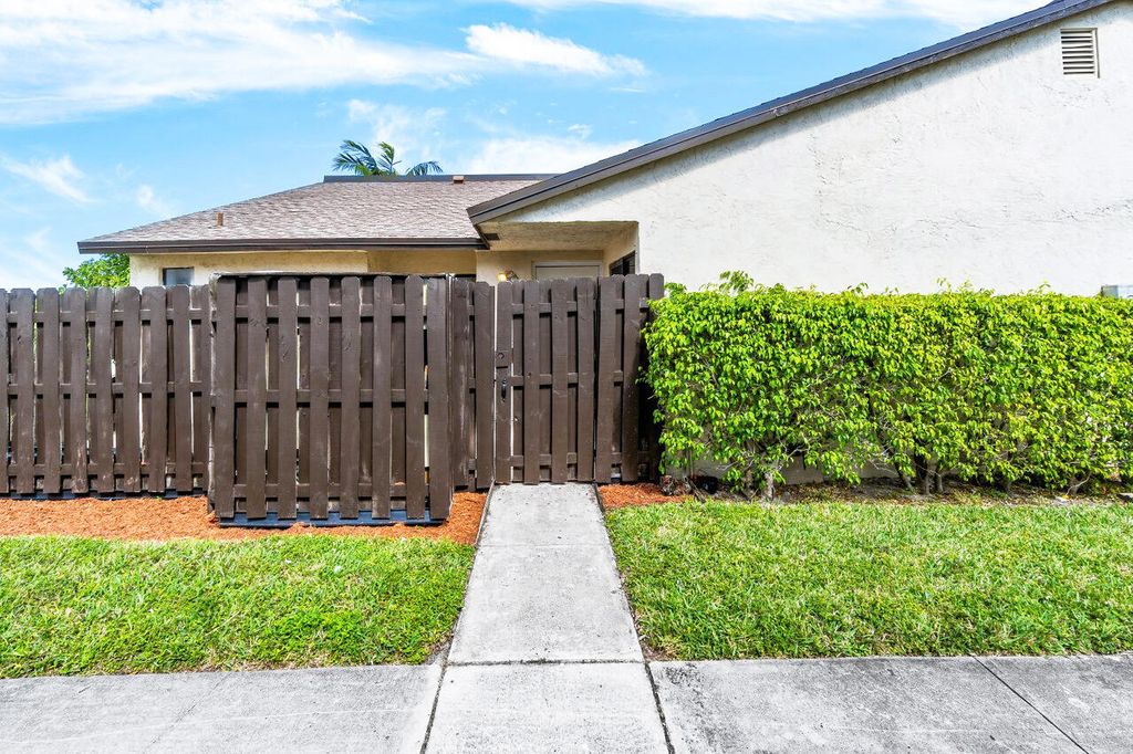 Photo of 3701 Waterview Circle, Palm Springs, FL 33461 (MLS # R10960133)