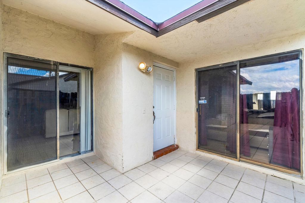 Photo of 3701 Waterview Circle, Palm Springs, FL 33461 (MLS # R10960133)