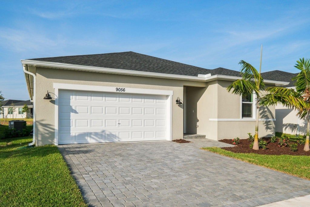 Photo of 9056 Dahlia Circle, Port Saint Lucie, FL 34986 (MLS # R11059866)