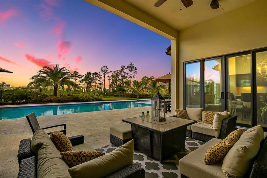 Presenting a 4 bedroom + club room, 5.5 bath gem on .75 acres in Prado, a gated community. This 1 story Yorkshire boasts a 3 car garage & legendary 46' X 20' pool. Inside natural light, soaring ceilings and pure luxury inspire before walking past formal dining to the great room with panoramic views of your private paradise. An open kitchen features KitchenAid & Jenn-Air brands, floor to ceiling cabinets, walk-in pantry, large island, quartz countertops and casual dining overlooking the pool. The Owner's Suite stuns with 2 walk-in closets, dual vanities, glass shower, Jacuzzi Tub and sitting area. The home is finished with a laundry room, 3 guest bedrooms with en suites & walk-in closets, cabana bath and a club room with private pool access. 2016 Built w/ Impact Glass & $300k in Upgrades!