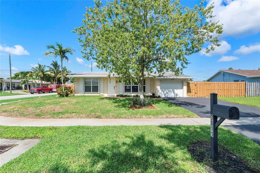 Welcome to this inviting 3BR/2BA home on a spacious corner lot with a large fenced yard, perfect for outdoor living and entertaining. The beautifully remodeled kitchen features custom cabinetry, gas stove, and stainless appliances, flowing into bright and comfortable living areas with a warm, neutral style. Enjoy the enclosed patio for year-round relaxation, with most impact windows and sliders plus shutters for added peace of mind. The stove and water heater run on gas, helping reduce electricity costs. 2016 roof has been maintained with new soffits and gutters, offering plenty of remaining life. Modern fans, updated baths, and a true 1-car garage add comfort and convenience. With no HOA and prime location near Sawgrass Mills and Sawgrass Expressway, this is the perfect place to call home