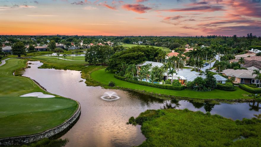 A One-of-a-Kind Estate with 350 Feet of Waterfrontage on one of Ibis's most valuable lots. Set on a rare .70-ACRE, pie-shaped cul-de-sac lot with 350 FEET OF WATER FRONTAGE, this majestic estate offers sweeping panoramic views of lakes and the Jack Nicklaus-designed Legend Course, holes 5, 6, and 7. Designed to impress yet created for everyday comfort, the property has been fully reimagined with a modern, zen-inspired aesthetic that emphasizes harmony, openness, and connection to its extraordinary surroundings. Inside, expansive windows flood the interiors with natural light and frame the resort-style pool and grounds. The flow between formal and casual spaces makes the home ideal for both intimate living and grand entertaining.