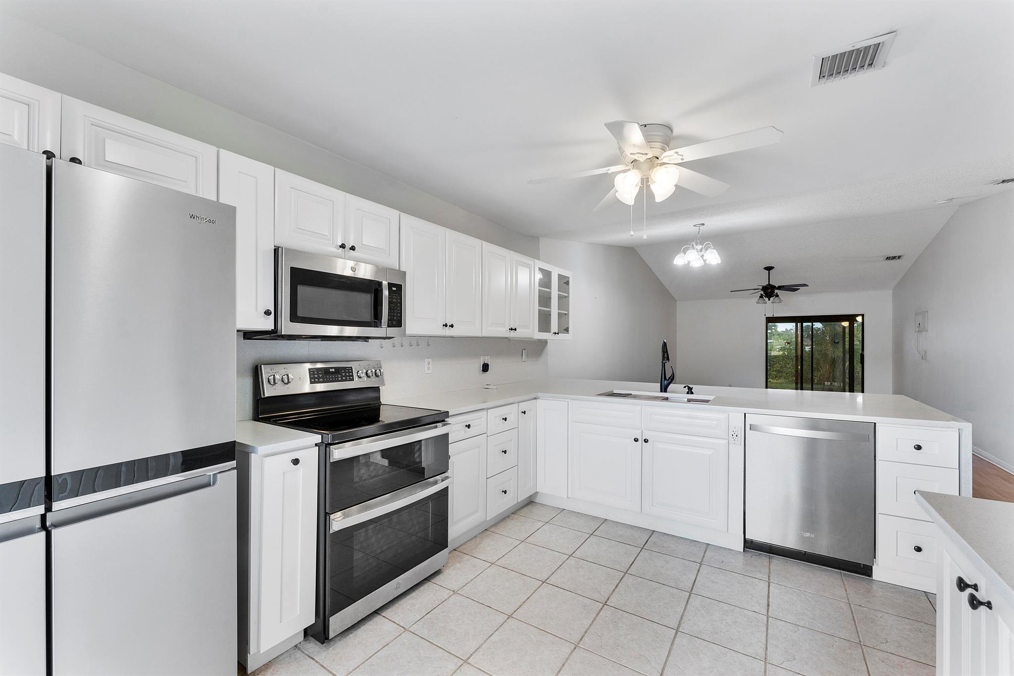 This clean move-in ready 2 bedroom, 2 bathroom 1 car garage located in the beautiful Arbours II, an active adult community villa offers an open layout, updated kitchen with quartz waterfall island, stainless steel appliances to include a double oven and quad-door fridge, a pantry, and ample storage. Both bathrooms are also fully renovated. Enjoy extra 189 square ft of living space in your ''Florida Room'' followed by a peaceful and shaded back patio. This property is in a great location, minutes from the Wellington mall, food, entertainment, and the turnpike.