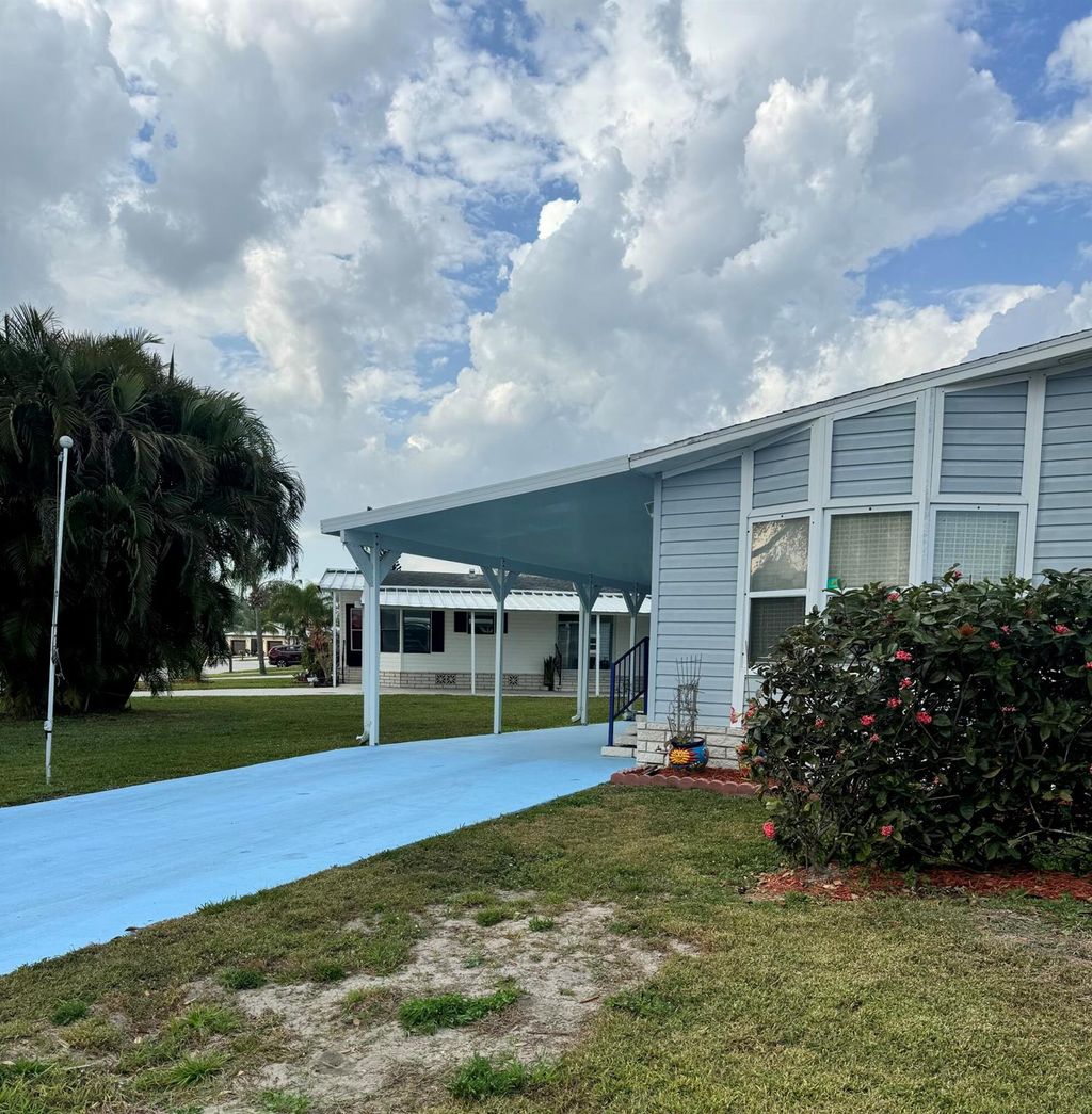 Photo of 14338 Cancun Avenue, Fort Pierce, FL 34951 (MLS # R11063180)