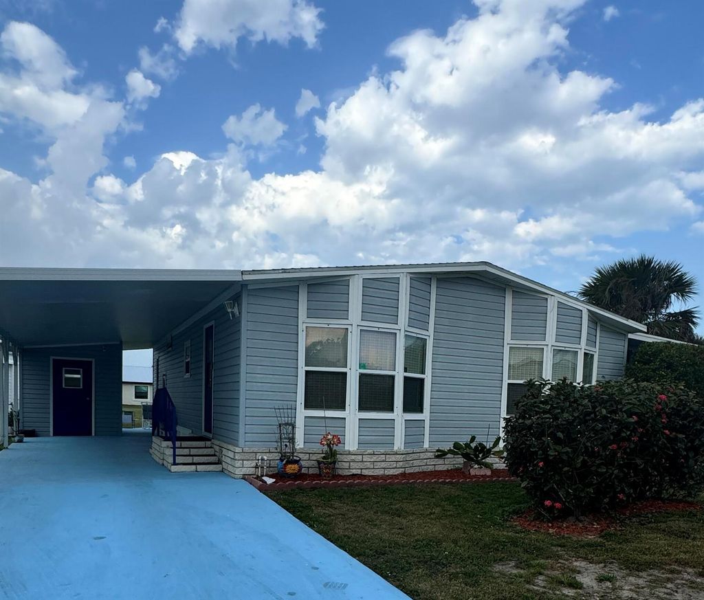 Photo of 14338 Cancun Avenue, Fort Pierce, FL 34951 (MLS # R11063180)