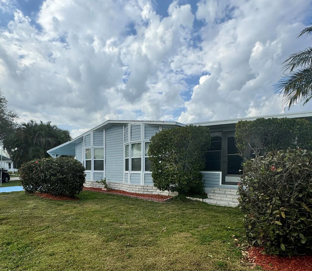 Photo of 14338 Cancun Avenue, Fort Pierce, FL 34951 (MLS # R11063180)