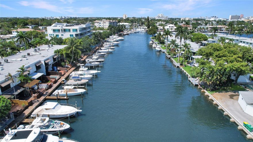Las Olas with boat slip! Stunning fully remodeled townhouse with prime deep-water boat slip, kayak/paddle board storage, and quick ocean access, no fixed bridges. Desirable east exposure with expansive covered outdoor living area plus three additional covered terraces. Upgrades include tile & LVT floors, custom cabinetry, new refrigeration, convection range/oven, bathrooms and bar with under-counter wine cooler. Impact windows and large floor to ceiling sliding glass doors with motorized shades throughout. Dual primary en-suite bedrooms and walk-in closets equipped with ELF storage system. There is also flex-use loft, full-size W/D closet, and additional storage closets. 4 parking spaces. Waterfront lifestyle opportunity minutes to beach, FLL, Las Olas, restaurants and shopping.