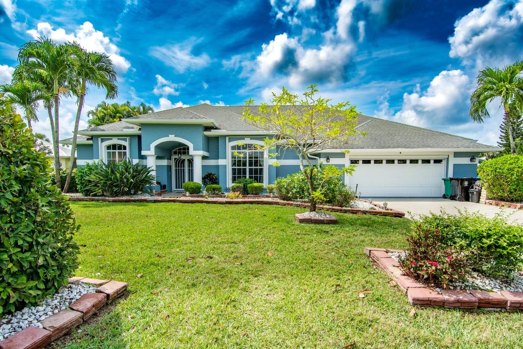 Photo of 2608 SW River Shore Drive, Port Saint Lucie, FL 34984 (MLS # R11095353)