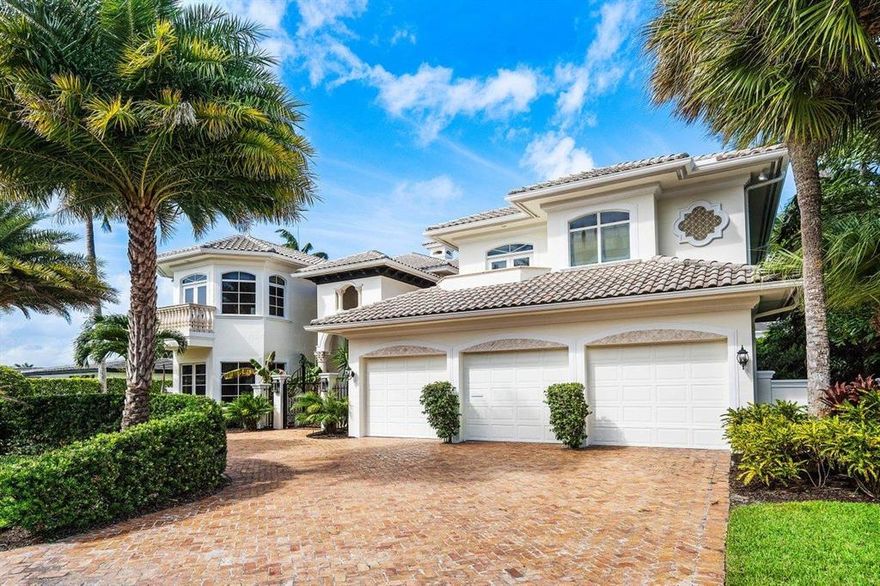 Come Love This & Live This deepwater luxury lifestyle at its finest!  This magnificent architecturally classic Venetian style home is located in east Boca Raton's most  sought after and prestigious neighborhood of Golden Harbour. Prime location to walk or take a relaxing bike ride to the beach or the Boca Resort. It's a short half mile walk to Mizner Park and in the heart of all downtown east Boca Raton has to offer with its fine dining and shopping.  This home boasts over 6,000 sq ft where everywhere you look the finest attention was given to detail.  Luxuries and fine custom finishes abound with coffered ceilings, crown moldings, and the finest of custom wood finishes throughout your home. Enter into a dramatic open, airy and light two story living room with its stately walls of glass